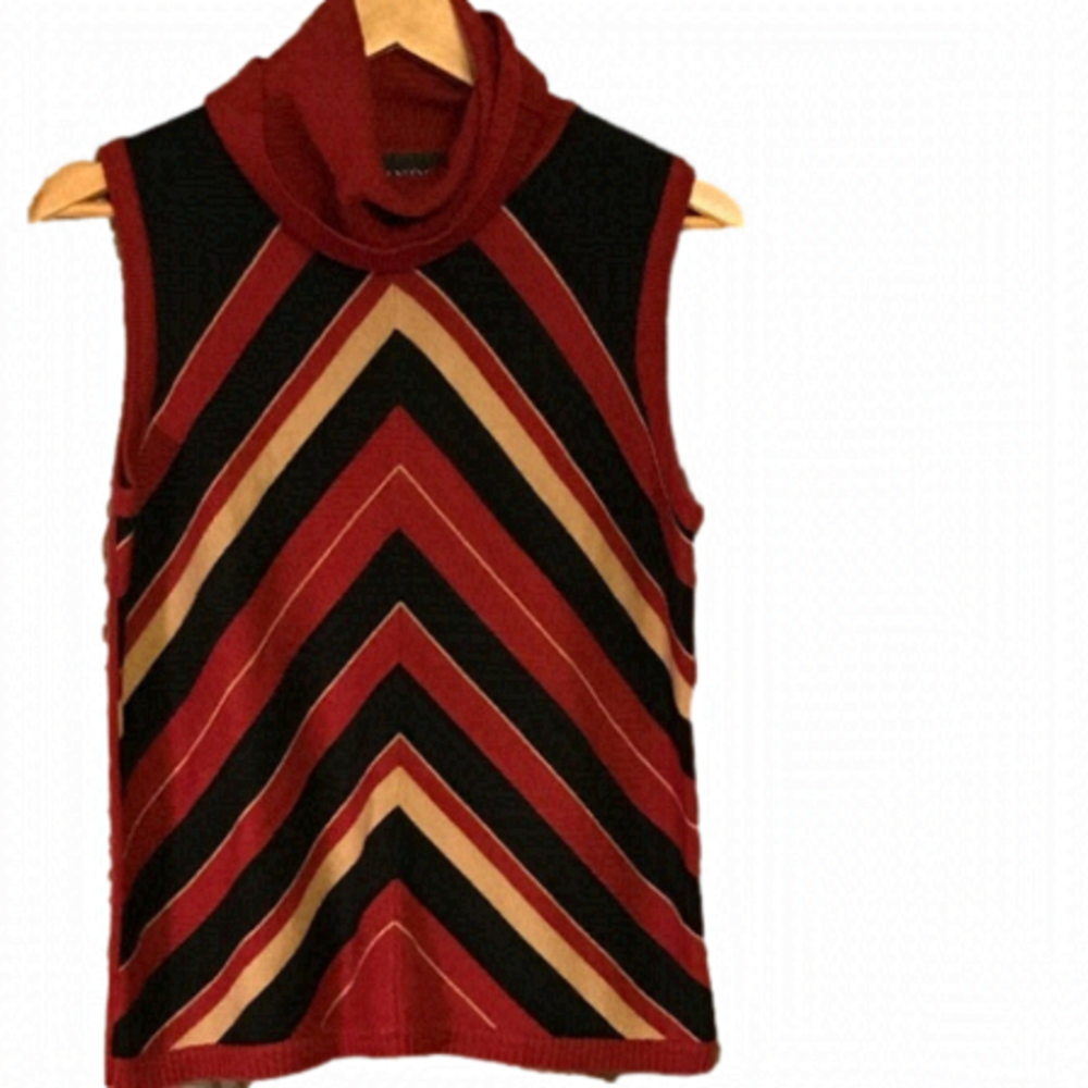 women’s size small Lindor sleeveless sweater. Excellent condition.